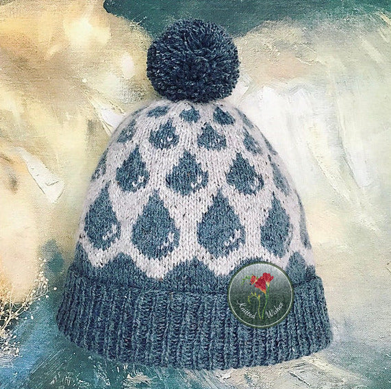 Knitted beanie with a raindrop pattern and on a textured background