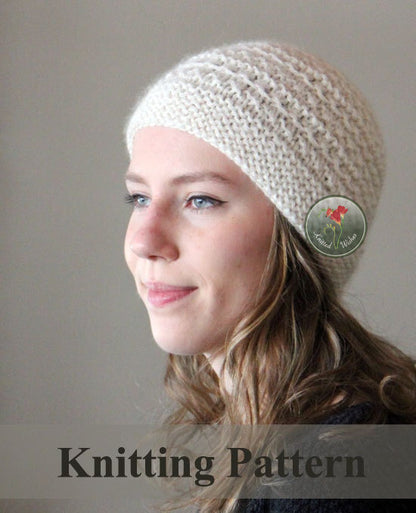 Woman wearing a chunky textured knitted beanie on a plain background